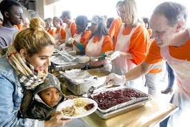 Volunteers serving hot meals